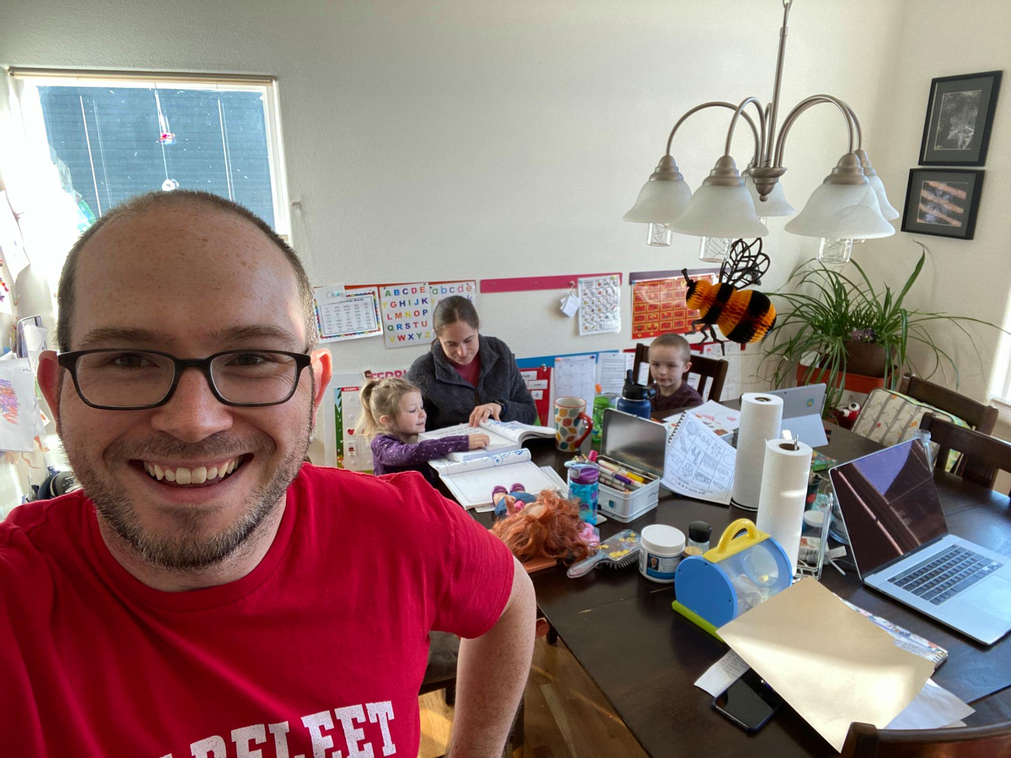 Nick for FoCo HQ - Nick's family around the kitchen table working on school