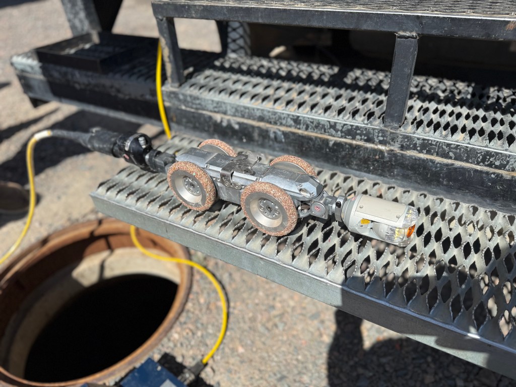 Boxelder Sanitation District Board and Staff checking out one of the new robots